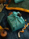 Furoshiki FabRap Reusable fabric gift wrapping. Furoshiki. Jade with gold stars design furoshiki. Exclusive designed furoshiki by FabRap. Zero waste gift wrap by FabRap. FabRap Furoshiki. FabRap fabric gift wrapping.