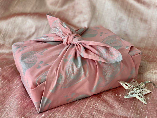 Furoshiki FabRap Reusable fabric gift wrapping. Furoshiki. Blush pink with silver paisley whales design furoshiki.Reversible furoshiki. Exclusive designed furoshiki by FabRap. Zero waste gift wrap by FabRap. FabRap Furoshiki. FabRap fabric gift wrapping.