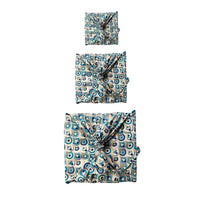 fabric gift wrapping art deco FabRap™.  Furoshiki FabRap Reusable fabric gift wrapping. Furoshiki. Art Deco and Ocean design furoshiki. Reversible furoshiki. Exclusive designed furoshiki by FabRap. Zero waste gift wrap by FabRap. FabRap Furoshiki. FabRap fabric gift wrapping.