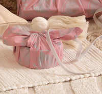 Furoshiki FabRap Reusable fabric gift wrapping. Furoshiki. Blush pink with silver paisley whales design furoshiki.Reversible furoshiki. Exclusive designed furoshiki by FabRap. Zero waste gift wrap by FabRap. FabRap Furoshiki. FabRap fabric gift wrapping.