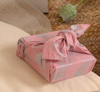 Furoshiki FabRap Reusable fabric gift wrapping. Furoshiki. Blush pink with silver paisley whales design furoshiki.Reversible furoshiki. Exclusive designed furoshiki by FabRap. Zero waste gift wrap by FabRap. FabRap Furoshiki. FabRap fabric gift wrapping.